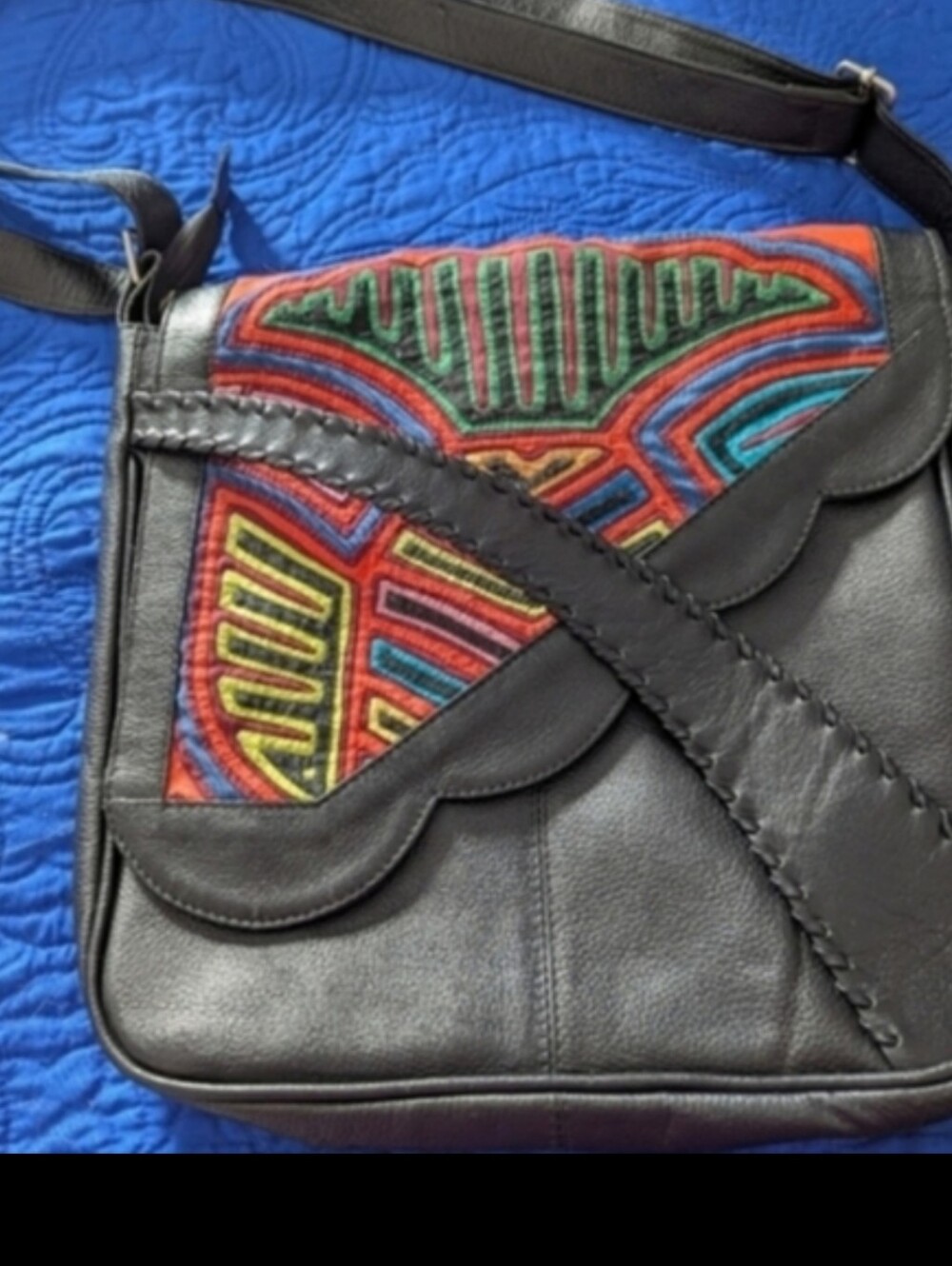 Material: Napa Leather , and Molas Width: 11.5Height: 10.5Strap: Max : 54" in